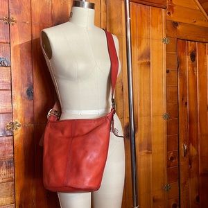 Red leather Coach cross body purse